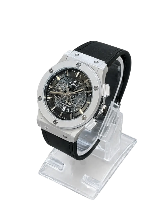 Silver skeleton watch dial close-up